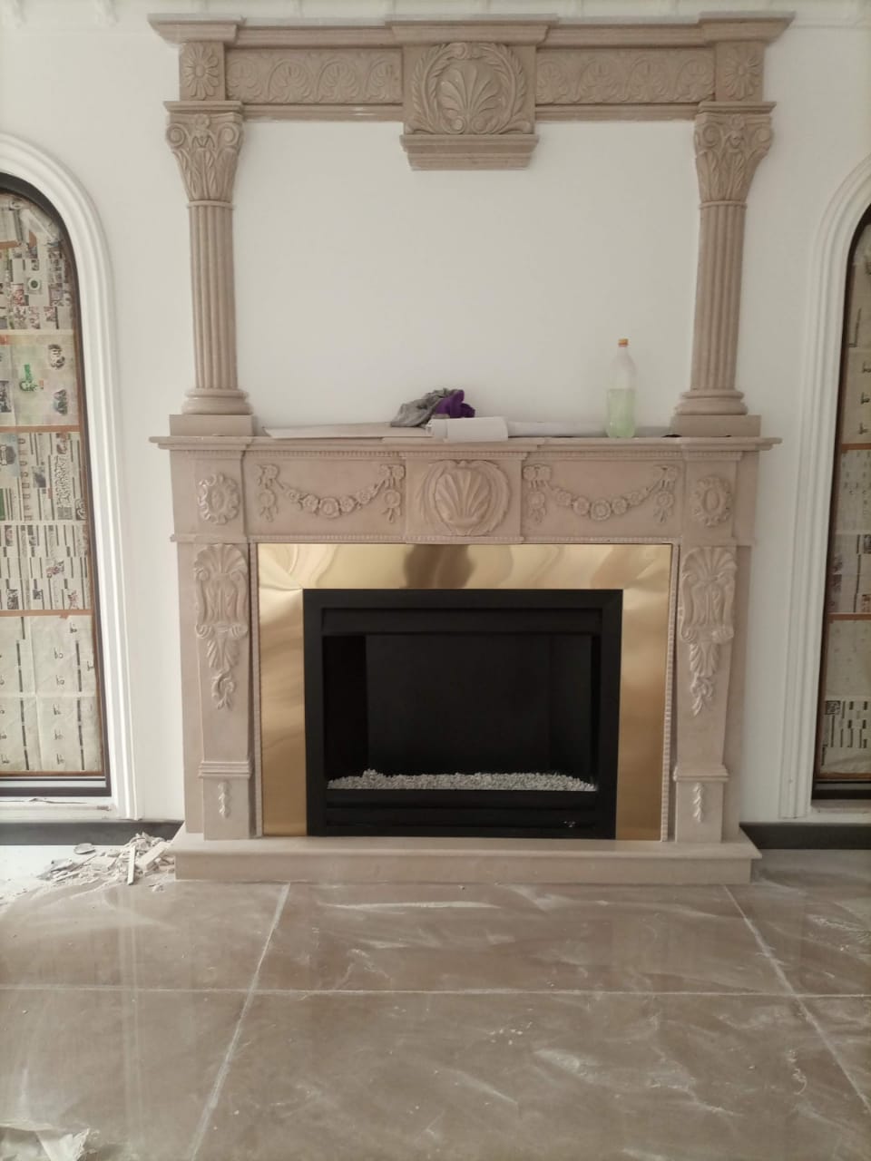 Indoor Bras fireplace with marble structure